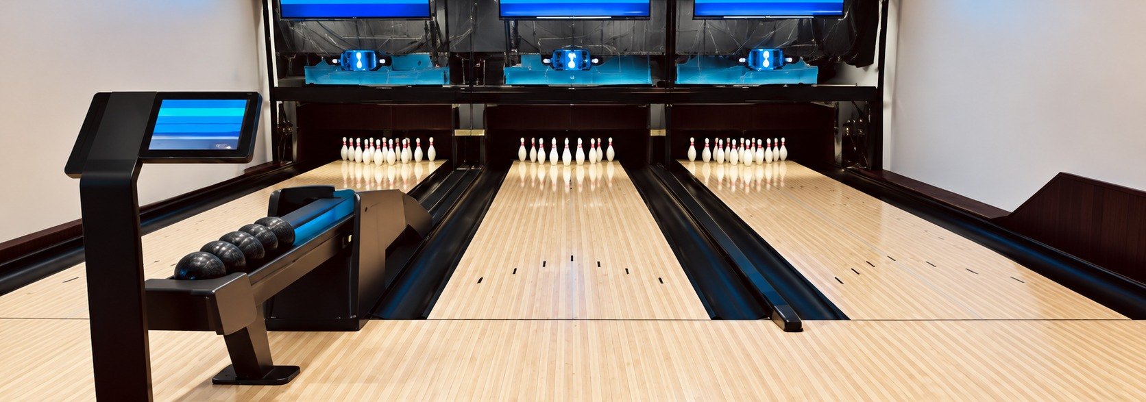 Three duckpin bowling lanes inside 218 TapHouse in Cloquet, Minnesota