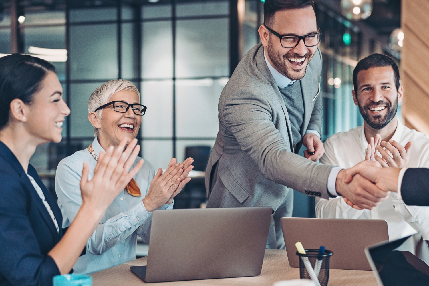 Business owners completing a successful business exit